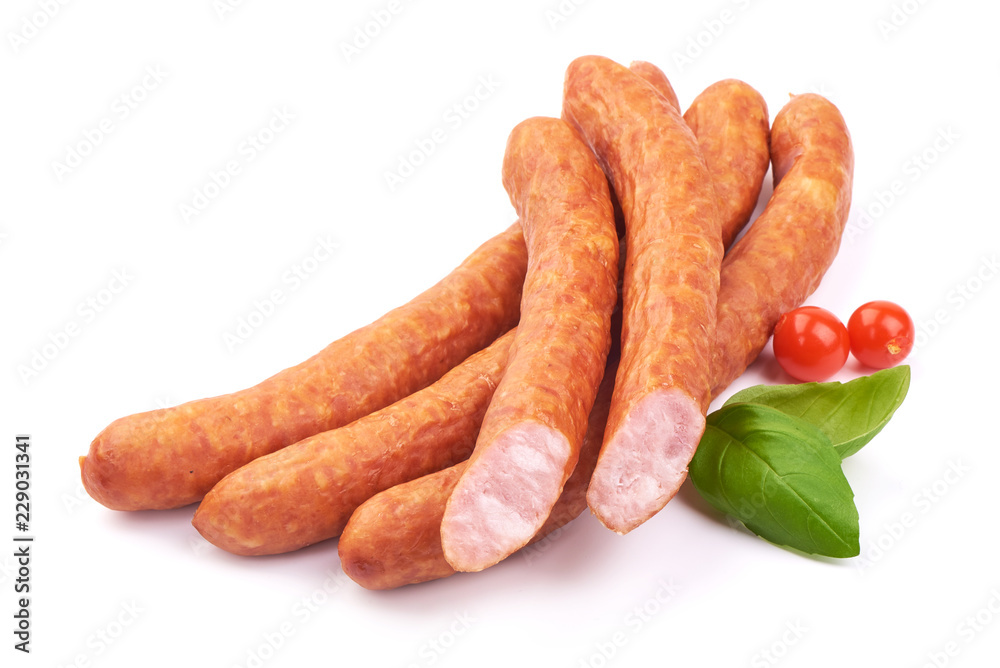 Landjager Dried Sliced German Sausages with basil leaves, isolated on a white background. Close-up Landjager Dried Sliced German Sausages with basil leaves, isolated on a white background. Close-up