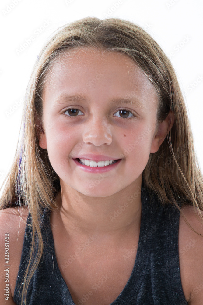 young girl face close up shot isolated on white young girl face close up shot isolated on white