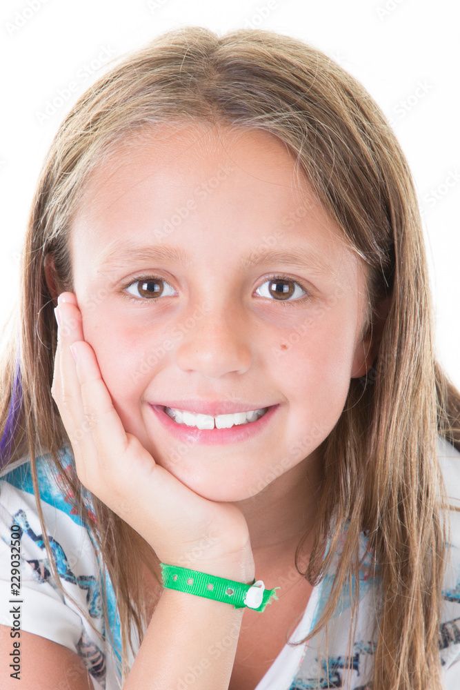 beautiful child girl posing in studio over white background beautiful child girl posing in studio over white background