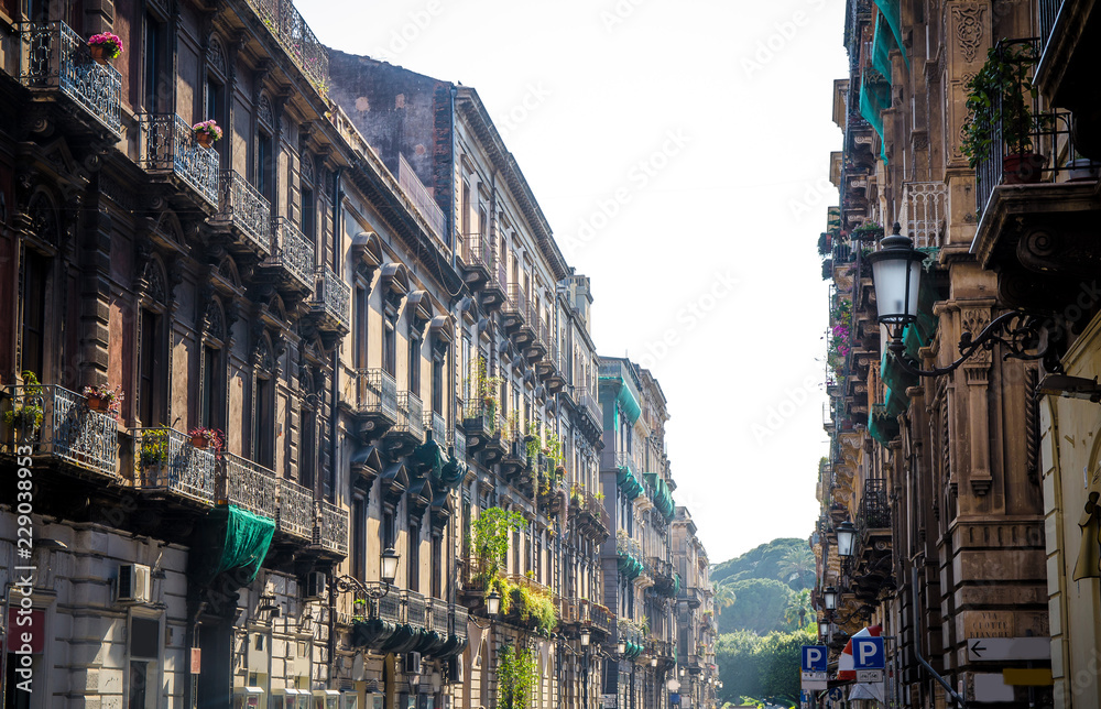 Typical street and buildings in old style, Catania, Sicily, Italy