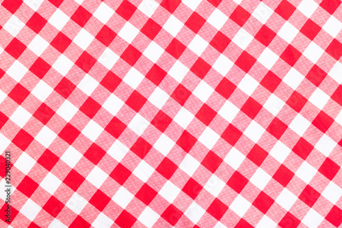 Texture of red and white checked textile background