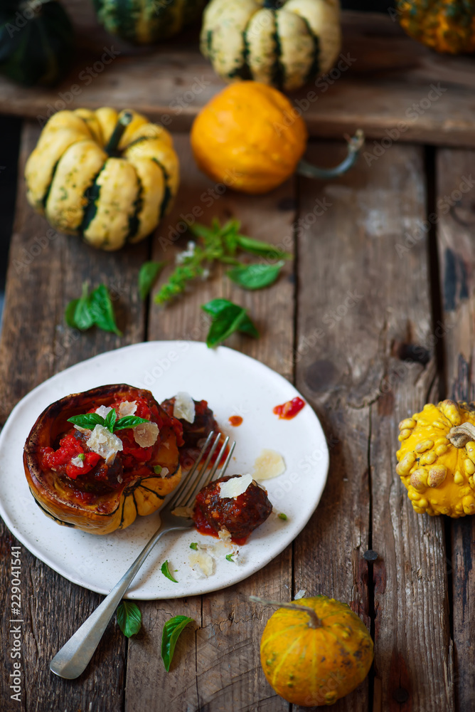 Meatball-stuffed squash with tomato sauce.selective focus Meatball-stuffed squash with tomato sauce.selective focus