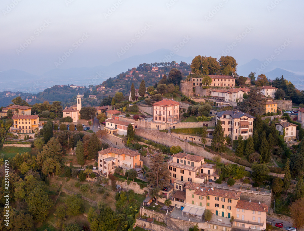 Bergamo, Italy. Drone aerial view of the hill of San Vigilio during sunrise