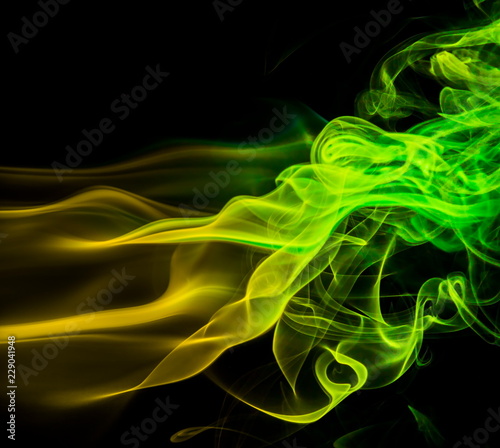 Colored smoke on black background