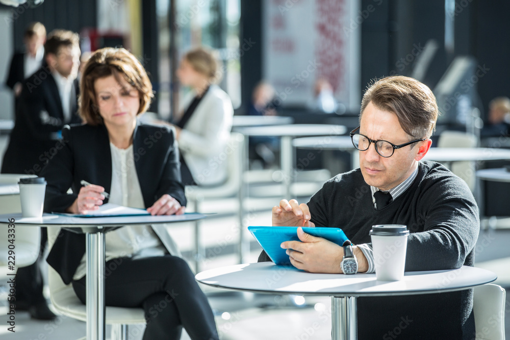 Business people in cafe Business people in cafe
