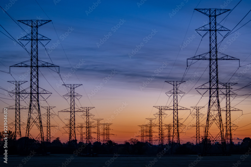 Symmetrical Electric towers at sunrise