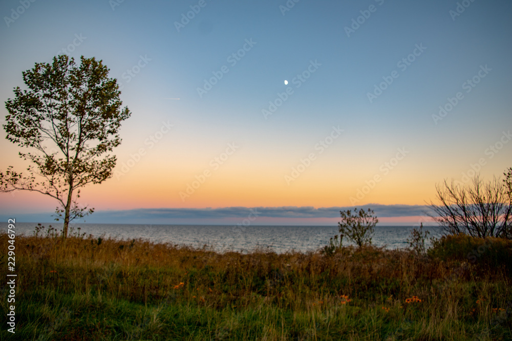 Blue hour at the coast with moon Blue hour at the coast with moon