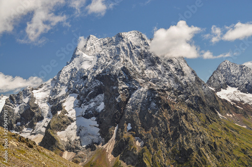 Closeup mountains scenes in national park Dombai, Caucasus, Russia, Europe. Sunshine weather and blue sky, summer day