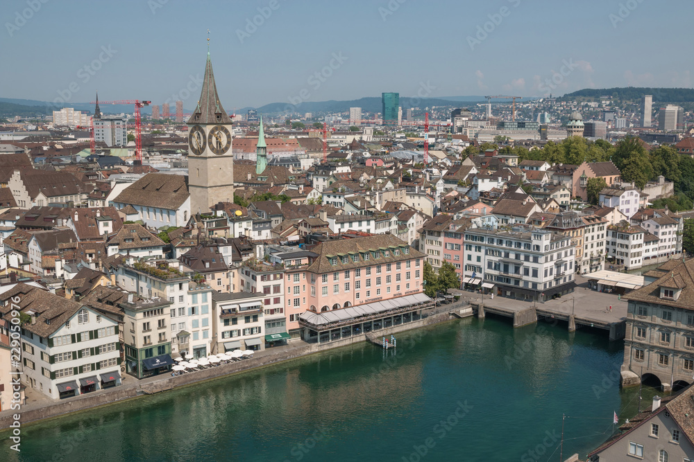 Zurich, Switzerland - June 19, 2017: Aerial view of historic Zurich city center and river Limmat from Grossmunster Church, Switzerland. Summer landscape