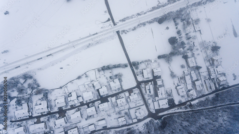 Top view of snow covered buildings.