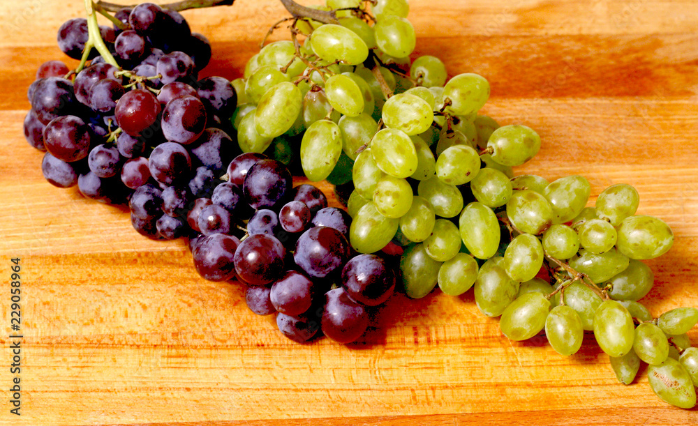 Grapes isolated wooden background shot 4 Grapes isolated wooden background shot 4