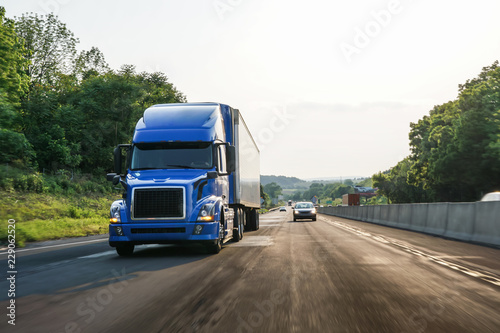 Semi 18-wheeler truck on highway 