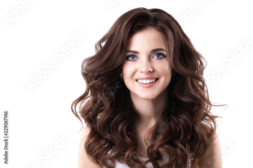 Beautiful young woman with curly hair isolated.