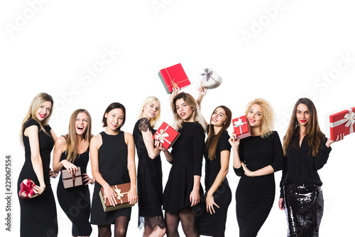 Group women in black with gift boxes.