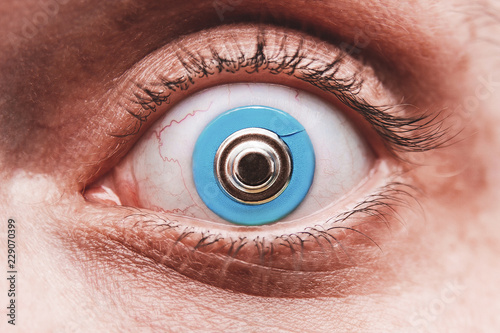 Eye with alkalin battery, instead of pupil, the concept of human use of various stimulants photo