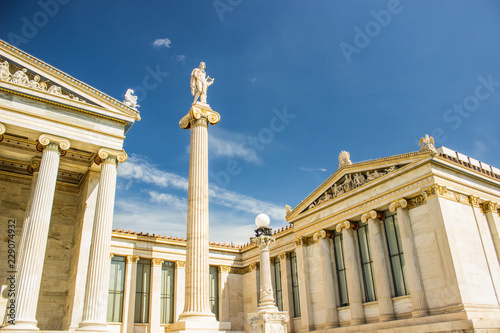 amazing architecture concept of ancient Greece old marble palace facade with columns statue and front yard, contrast blue sky background 
