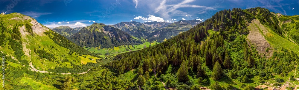 Aerial view of Elm village and Swiss mountains - Piz Segnas, Piz Sardona, Laaxer Stockli from Ampachli, Glarus, Switzerland, Europe - obrazy, fototapety, plakaty 