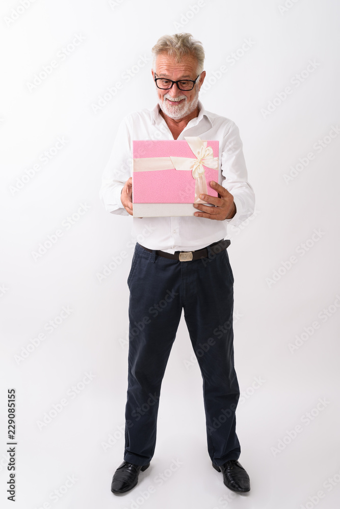 Full body shot of happy senior bearded man smiling and standing Full body shot of happy senior bearded man smiling and standing