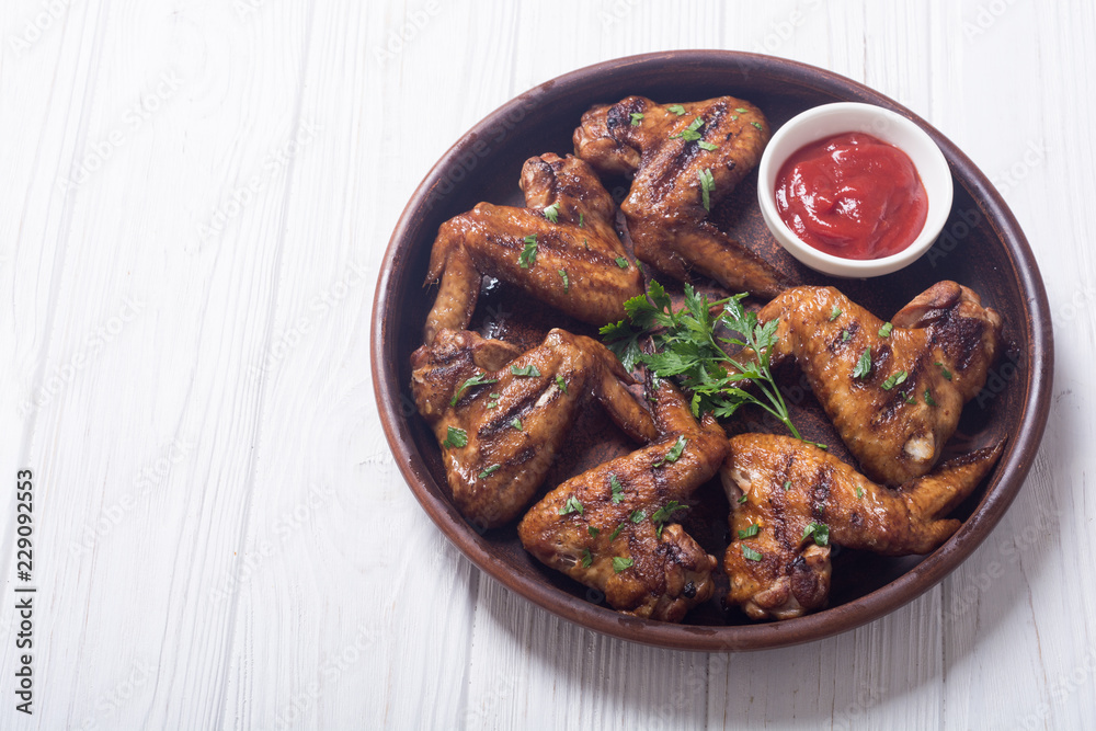 Grilled chicken wings with tomato sauce Grilled chicken wings with tomato sauce