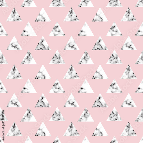 Trendy marble triangle seamless pattern on pink background.