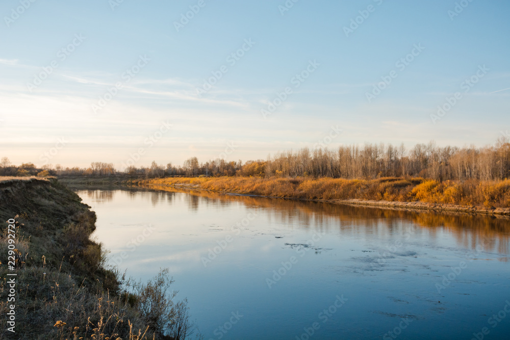 River in the fall. Gray weather in the fall.