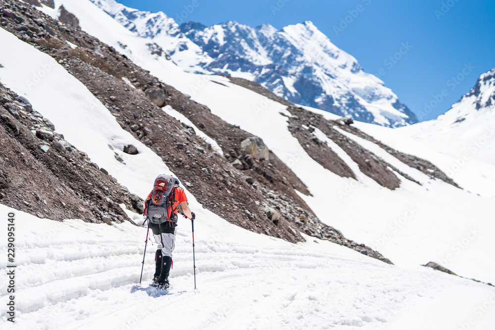 Andes valleys inside central Chile at Cajon del Maipo amazing views over snow mountains and glaciers a perfect place for hiking and having some adventure on a remote place with an awe rugged landscape