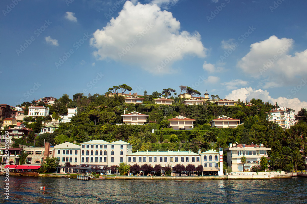 View of houses by Bosphorus on the Asian side of Istanbul. It is a sunny summer day.