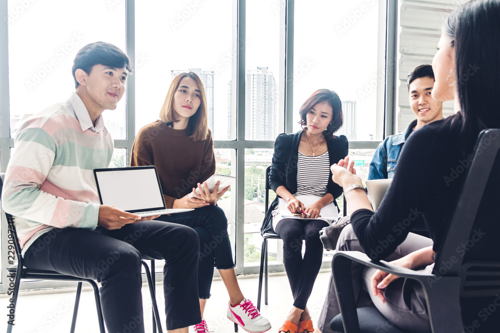Group of casual business discussing and working.creative business people planning and brainstorm in modern workloft.Teamwork concept Group of casual business discussing and working.creative business people planning and brainstorm in modern workloft.Teamwork concept