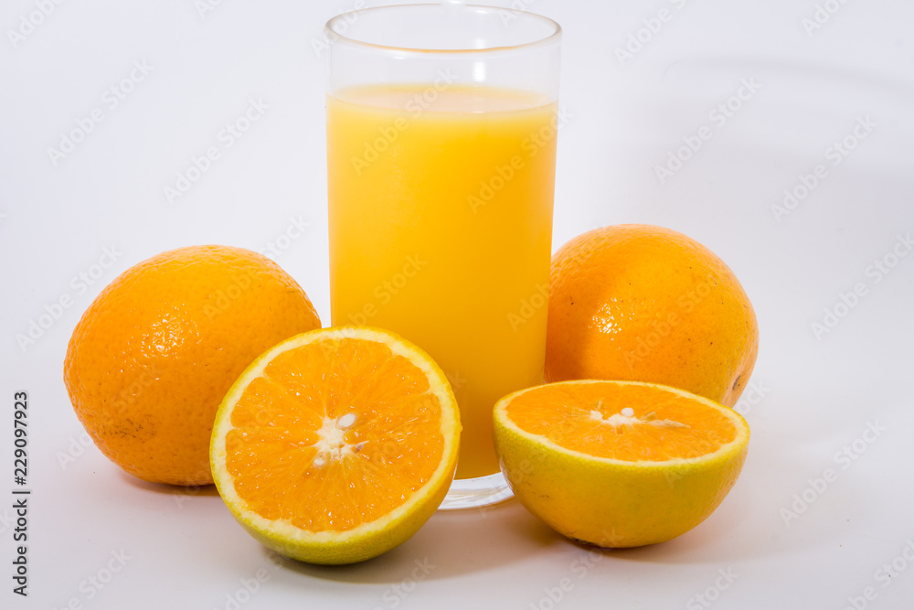 Some oranges in a basket on wooden background. Some oranges in a basket on wooden background.