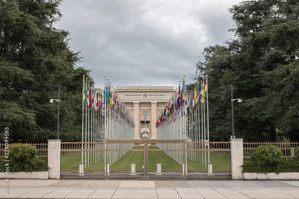 Geneva, Switzerland - July 1, 2017: National flags at the entrance in UN office at Geneva, Switzerland. The United Nations was established in Geneva in 1947 and is the second largest UN office