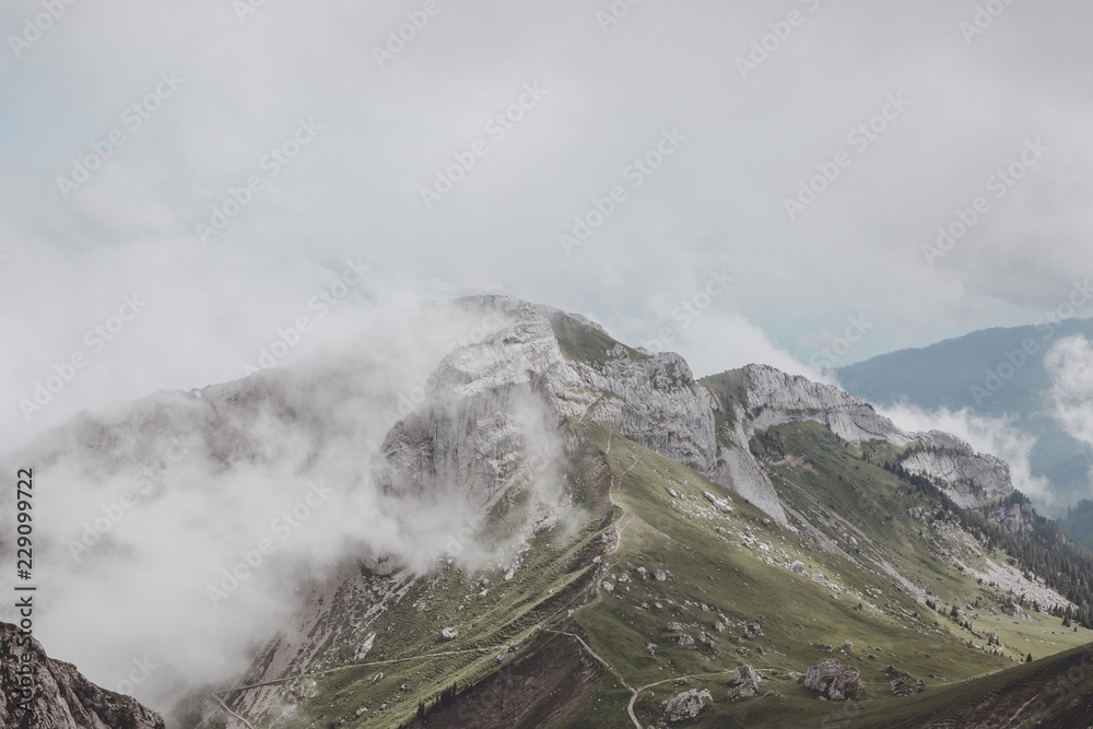 View mountains scene from top Pilatus Kulm in national park Lucerne, Switzerland, Europe. Summer landscape, sunshine weather, dramatic sky and sunny day