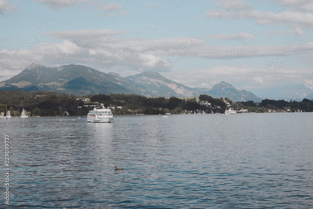 View on lake Lucerne and mountains scenes, Lucerne, Switzerland, Europe. Summer landscape, sunshine weather, dramatic blue sky and sunny day