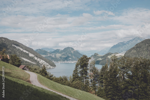 View mountains scene from top Pilatus Kulm in national park Lucerne, Switzerland, Europe. Summer landscape, sunshine weather, dramatic sky and sunny day