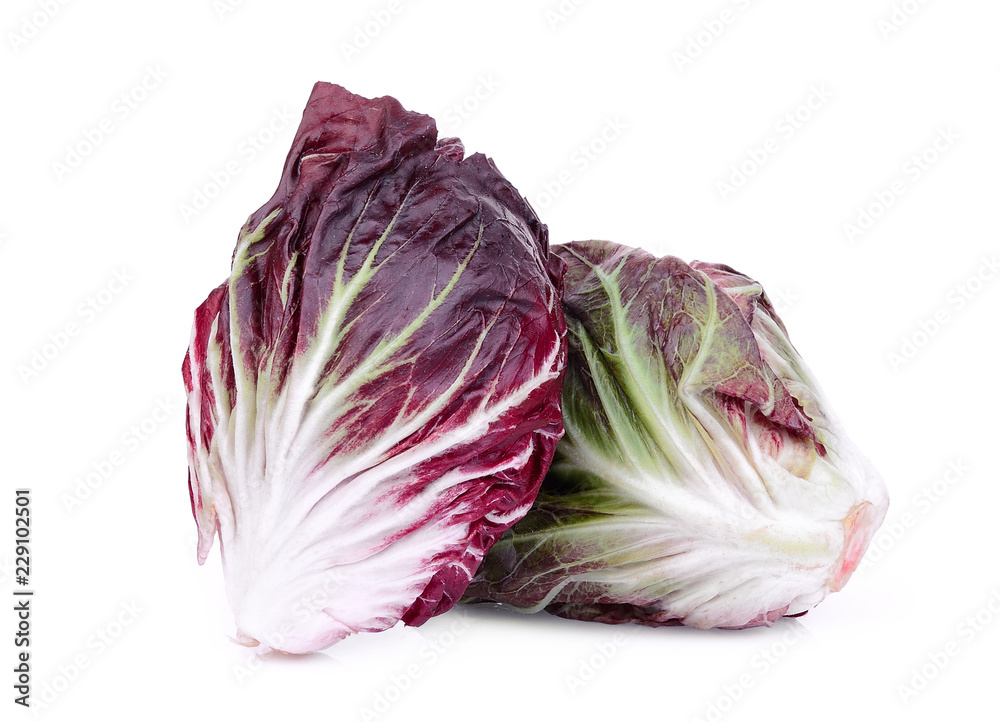 Fototapeta premium two whole red radicchio isolated on white background