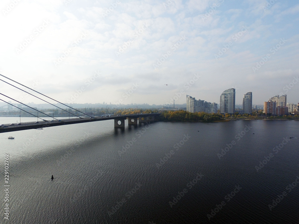 Cityscape on the Dnieper river, Kiev city, Moscow bridge,Drone aerial image.