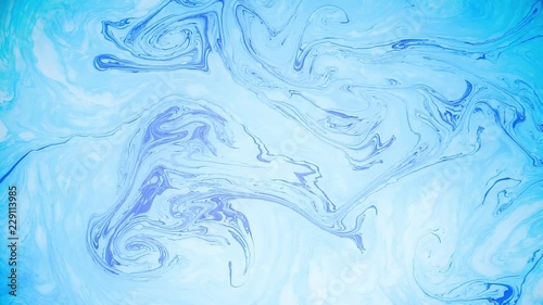 Abstract paint ink in motion. Psychedelic background footage. Colorful spots.