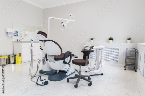 medicine, stomatology, dental clinic office, medical equipment and instruments for dentistry - dentistry equipment, brown chair