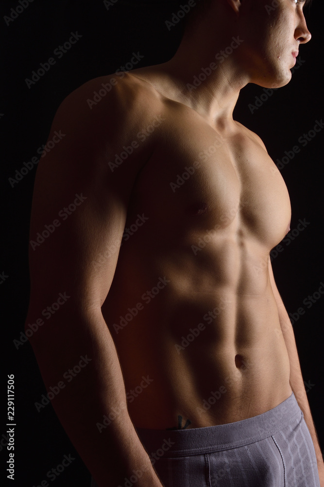 portrait of a man without clothes black background portrait of a man without clothes black background