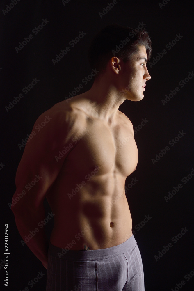 portrait of a man without clothes black background portrait of a man without clothes black background