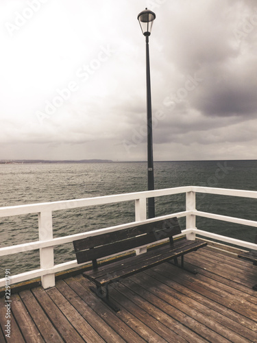 Wooden pier on the cloudy day