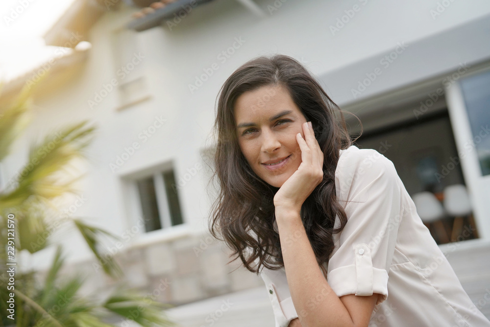 Portrait of attractive brunette woman, outdoor scene Portrait of attractive brunette woman, outdoor scene