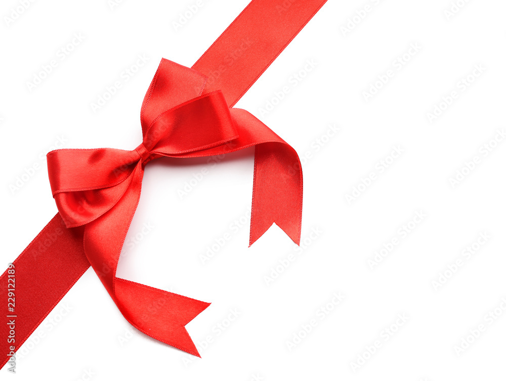 Red ribbon with bow on white background Red ribbon with bow on white background