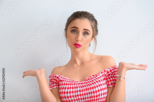 Emotional young woman on li...