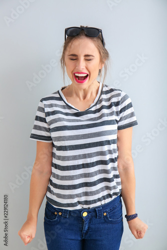 Stressed young woman on lig...