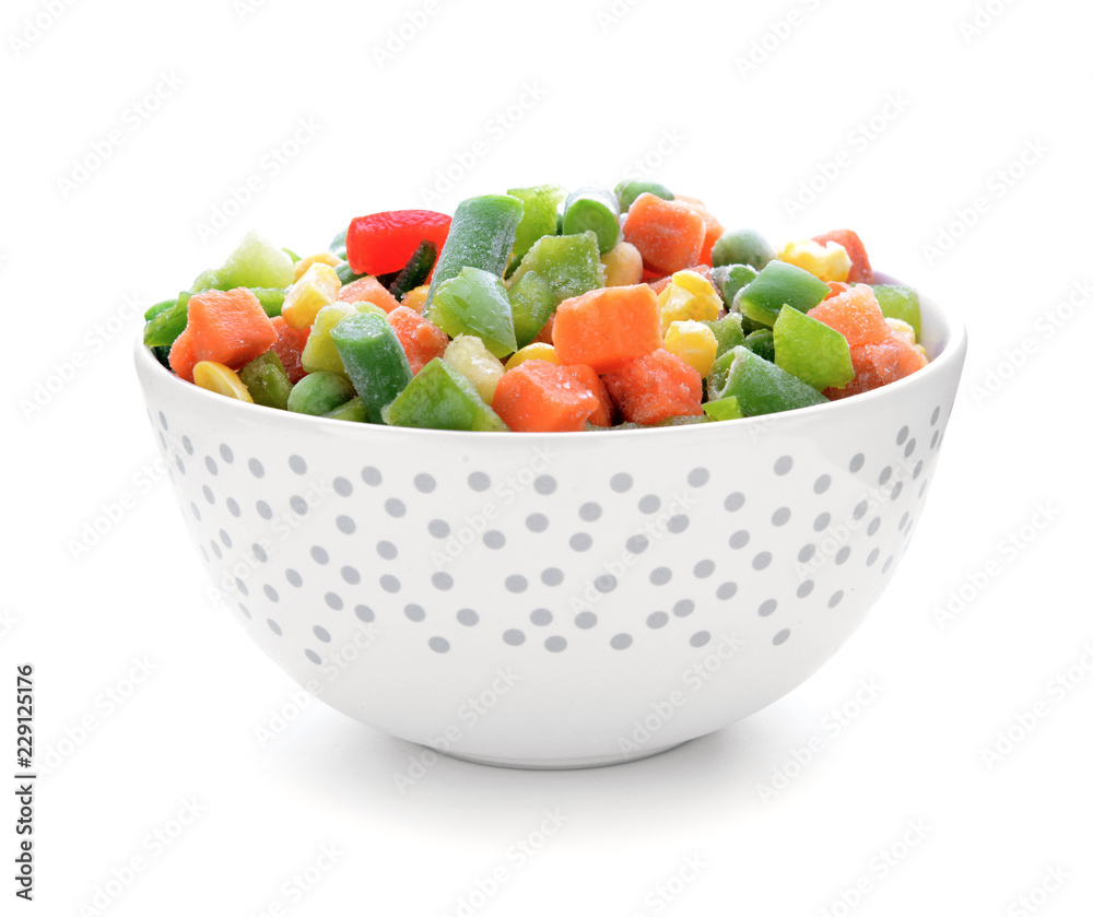 Bowl with frozen vegetables on white background