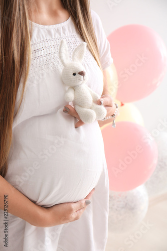 Beautiful pregnant woman wi...