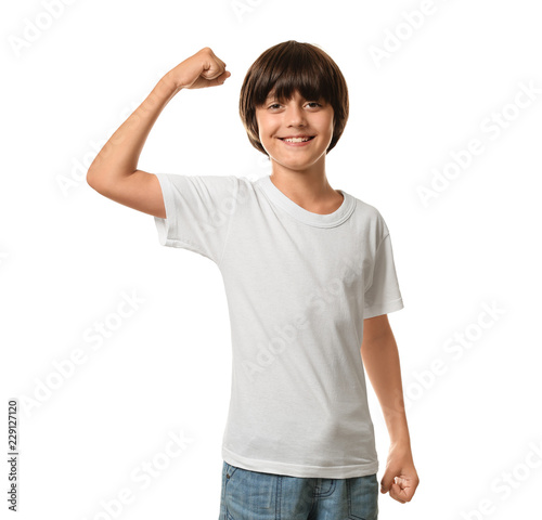 Little boy in t-shirt showi...