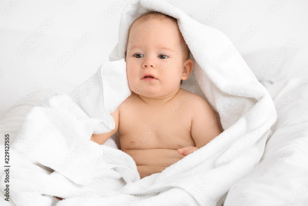 Cute little baby with soft towel on white background Cute little baby with soft towel on white background