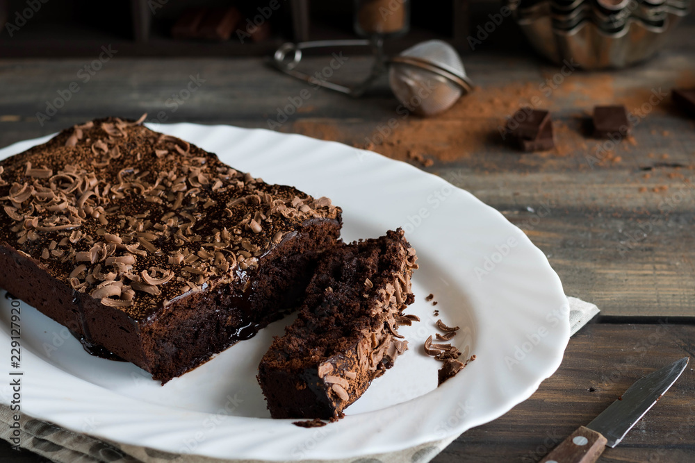 Chocolate pound cake with chocolate icing and chocolate chips Chocolate pound cake with chocolate icing and chocolate chips