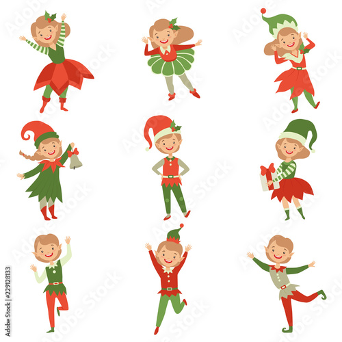 Cute playful boys and girls in elf costumes, little Santa Claus helpers characters vector Illustration on a white background photo